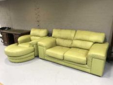 A green Sis Italia leather two seater settee and cuddle armchair with stool