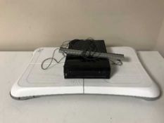 A Nintendo Wii with leads and accessories inc.