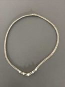 18 ct white gold necklace set with pearls and diamonds about .9ct. 28.