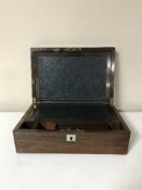 A Victorian inlaid rosewood writing box