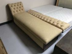 A late 19th century mahogany framed chaise longue in yellow striped material