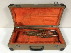 A cased brass Lafleur trumpet