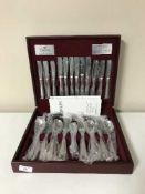 A mahogany canteen of Viner's stainless steel cutlery (44 pieces)