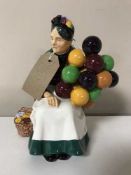 A Royal Doulton figure - The Old Balloon Seller HN 1315