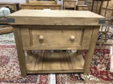 A reclaimed pine butchers block fitted a drawer