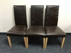 Set of high backed brown leather dining room chairs