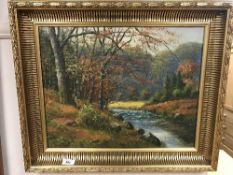 A continental oil on canvas depicting a stream