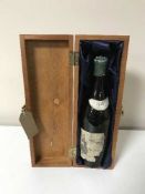 A bottle of 1947 Gevrey wine in wooden box,