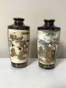 A pair of 20th century blue and gilded vases depicting Geisha