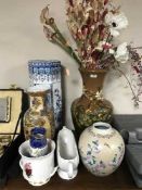 A large pottery hand painted vase of dried flowers, six assorted oriental vases, stick pot,