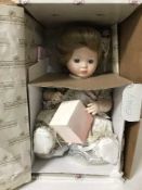 Seven boxed Ashton Drake dolls,