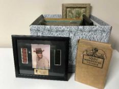 A box containing assorted books including monotype manuals,