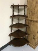 A five tier corner what not stand