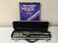 A modern Odyssey flute, cased,