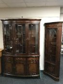 A mahogany Bradley triple door display cabinet fitted cupboards beneath together with matching