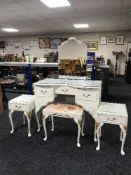A white and gilt Queen Anne style dressing table with stool,