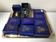 A tray of ten boxed Atlas eggs on stands