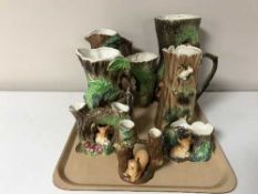 A tray of eight assorted Hornsea Fauna pottery vases and jugs