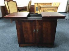 A hostess trolley in mahogany cabinet