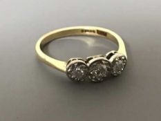 18ct three stone diamond ring approximately .35ct, 2.
