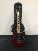 A Kay Les Paul style 1970's guitar in a soft carry bag