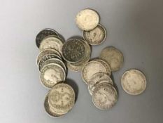 One hundred and twenty-three silver three pence coins