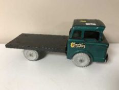 A mid 20th century tin plate Powerhouse flatbed truck