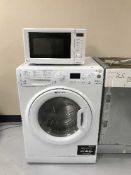 A Hotpoint washing machine and a microwave oven