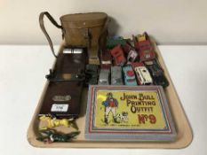A tray of cased binoculars, boxed John Bull printing outfit No.