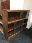 A mahogany three tier stacking bookcase