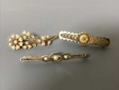 Three 15ct gold brooches, two set with pearls, 8.
