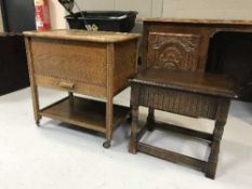 An oak sewing trolley and an oak side table