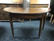 A Victorian d-shaped table