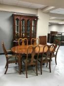 An eight piece dining room suite