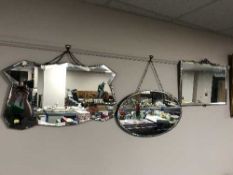 Two un-framed mirrors and a chrome framed mirror