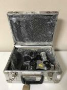 A aluminium camera case containing Contex camera, Yashica camera,