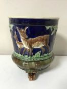 A Majolica style planter decorated with deer