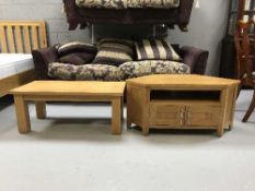 An oak corner TV stand and matching coffee table