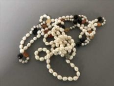 A large single and double strap of fresh water pearls