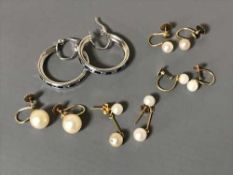 Five pairs of gold earrings