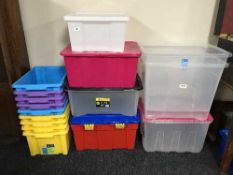 A quantity of plastic storage crates