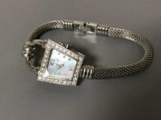 Corum watch with diamond bezel and dial (mother of pearl) approximately 1ct diamonds (cost new -