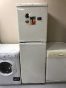 An Electrolux upright fridge freezer