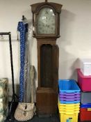 A 19th century oak long cased clock with painted dial (pendulum and weight)