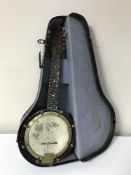 A Savana eight string banjo mandolin in carry case