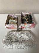 Two boxes containing assorted costume jewellery, silver fob, bank notes, coins,