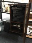A mahogany effect audio cabinet containing a Sony Hi/fi system and a pair of Sony speakers on