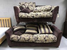 Two contemporary cloth settees with scatter cushions