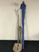 A fishing creel and accessories together with four assorted rods