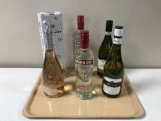 A tray containing two bottles of Smirnoff Vodka, 1 litre and 70cl, bottle of Prosecco,